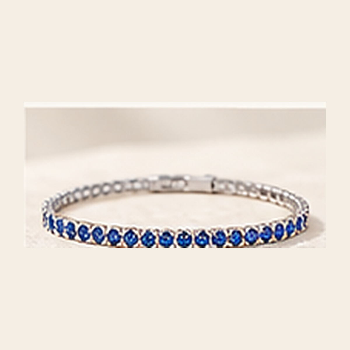 Philologi 3mm lab grown sapphire tennis bracelet on warm ivory silk