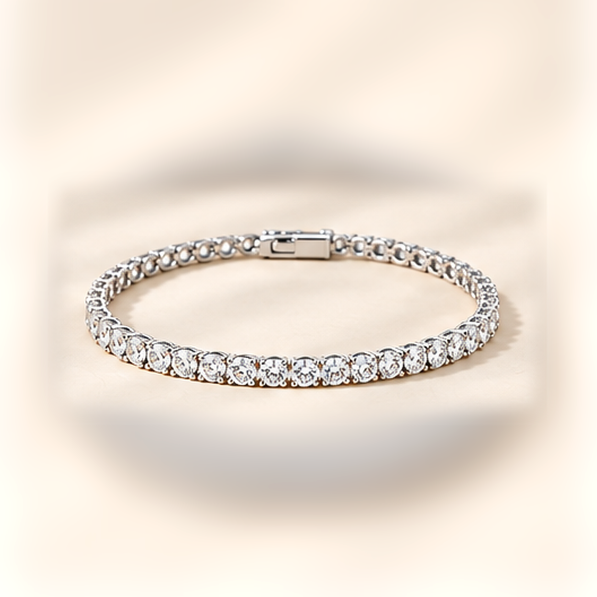 3mm round moissanite tennis bracelet in 925 sterling silver on warm ivory background