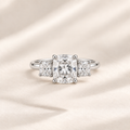 Philologi cushion moissanite three-stone ring with 2ct centre on warm ivory silk