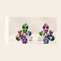 Philologi mixed cut moissanite stud earrings on warm ivory silk