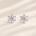 Philologi round moissanite stud earrings on warm ivory silk